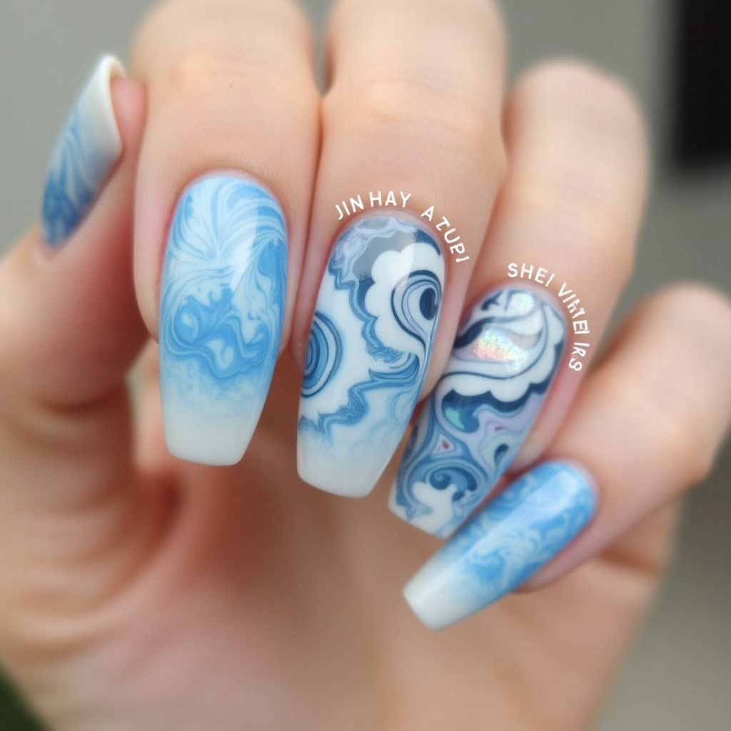 Pastel Blue Water Marbling Nail Design