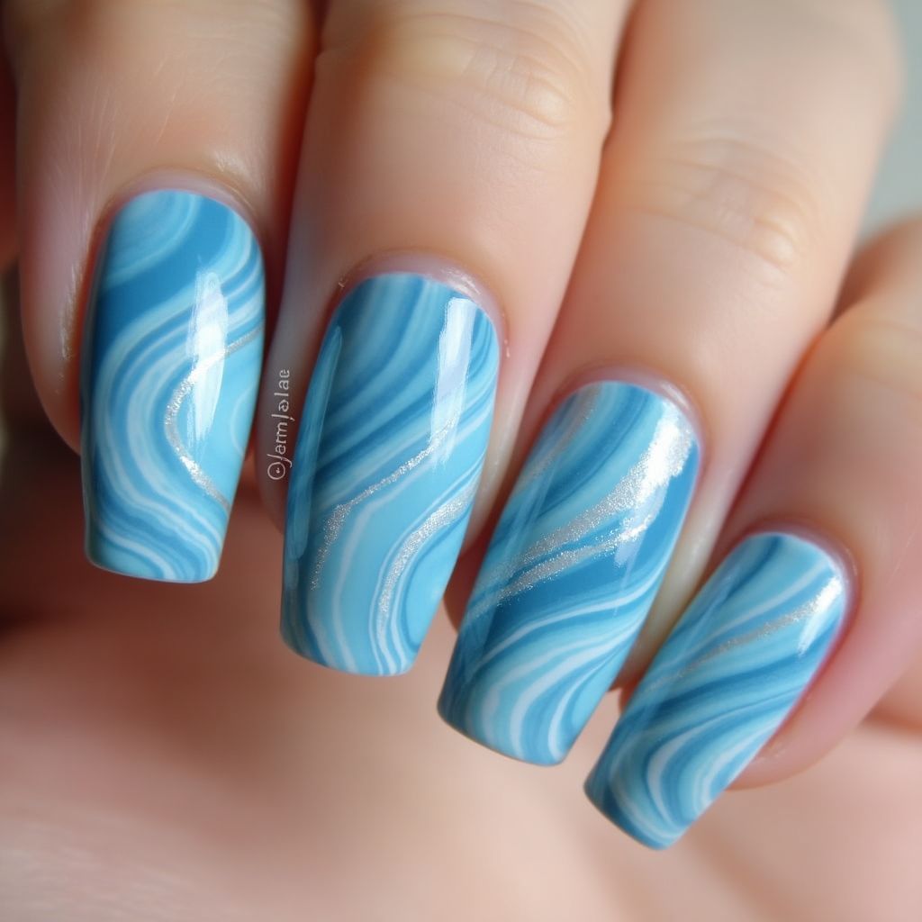 Sky Blue Water Marbling Nail Design